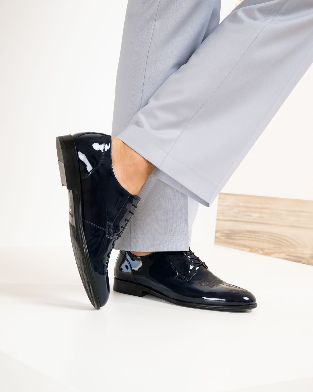 Stringate in vernice