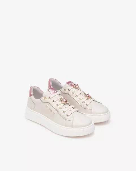 Sneakers in pelle con accessorio