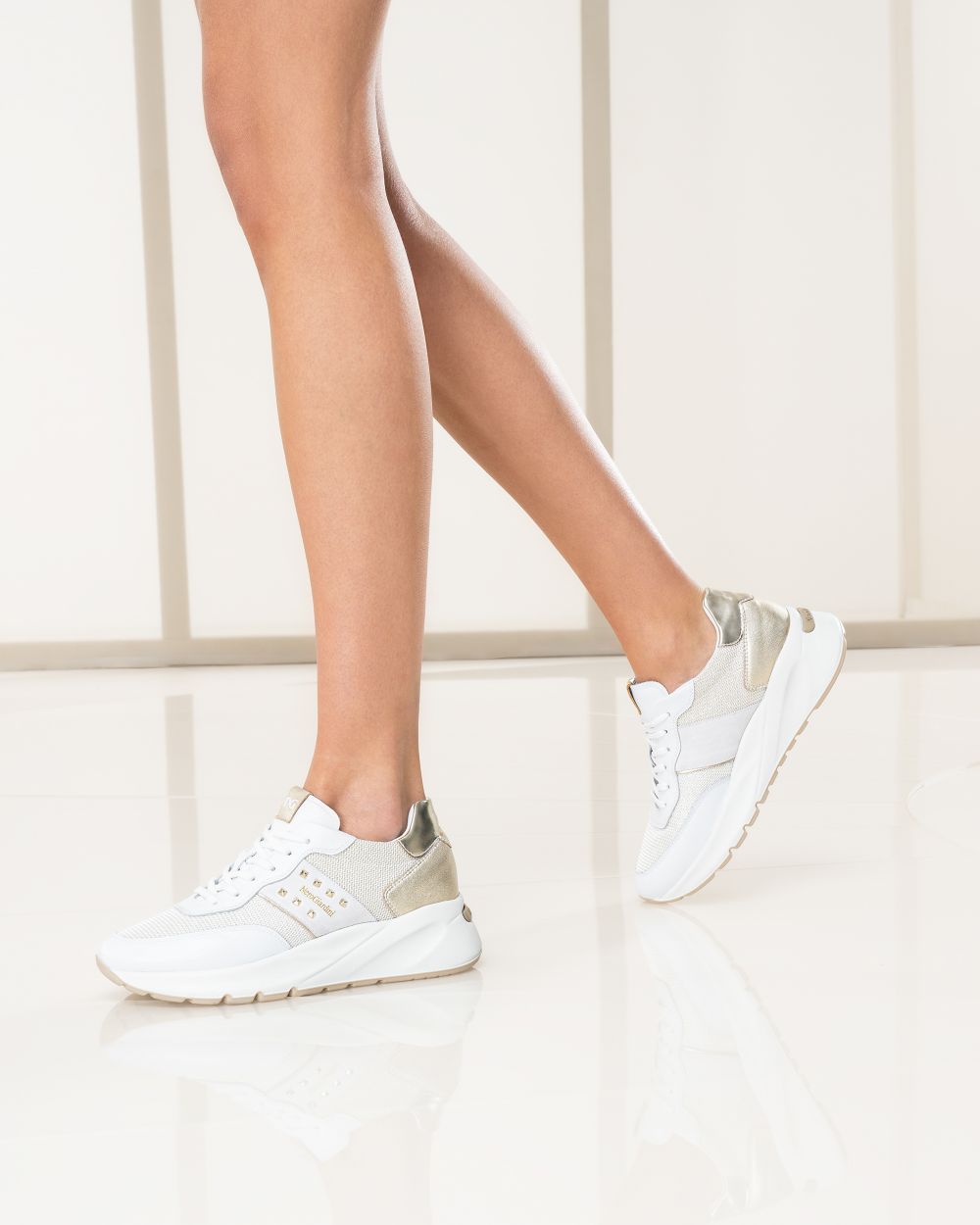 Sneakers in pelle e tela