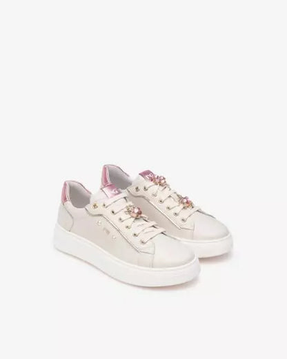 Sneakers in pelle con accessorio