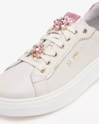 Sneakers in pelle con accessorio