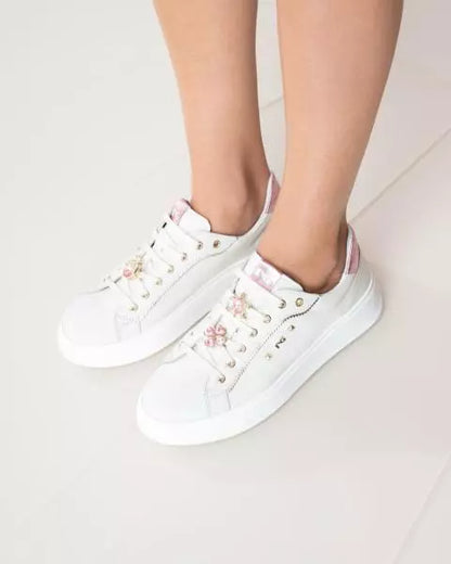 Sneakers in pelle con accessorio