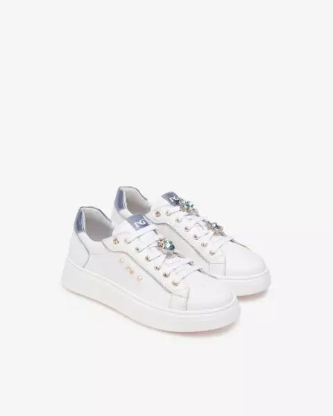 Sneakers in pelle con accessorio